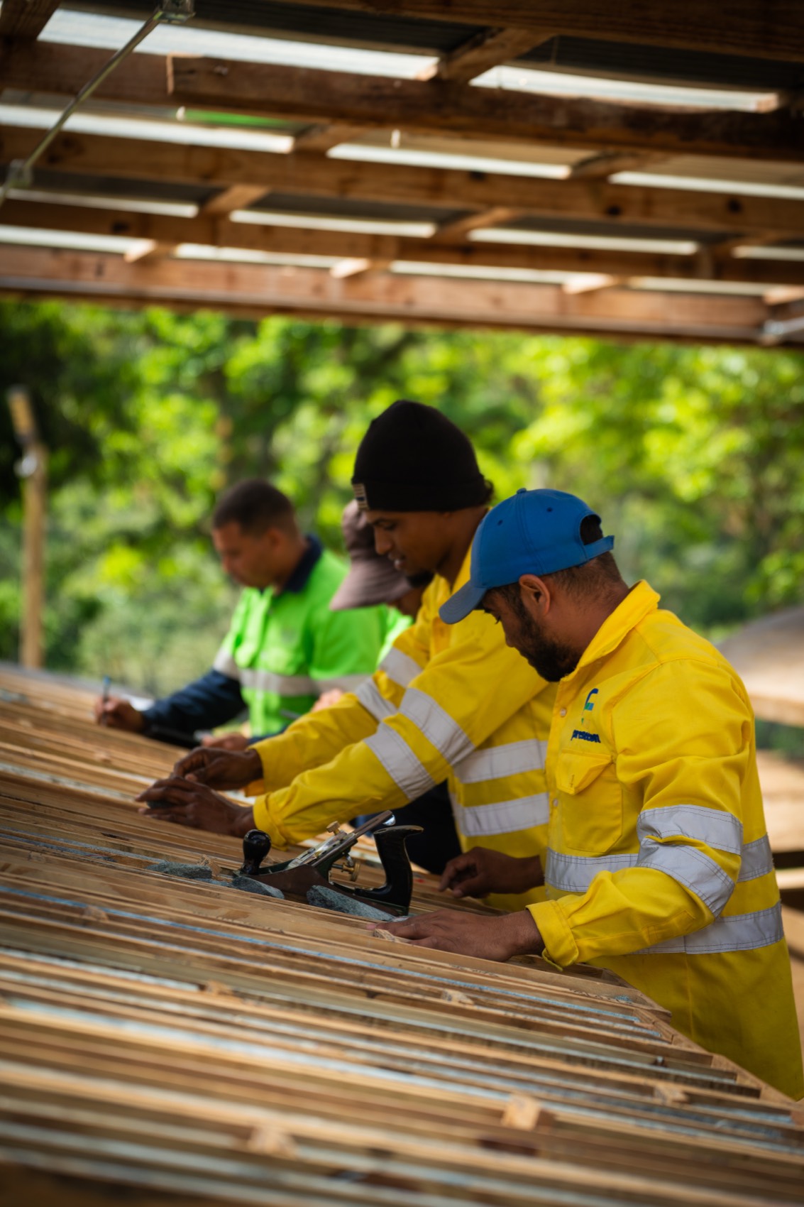 The GoldQuest crew logging drill core